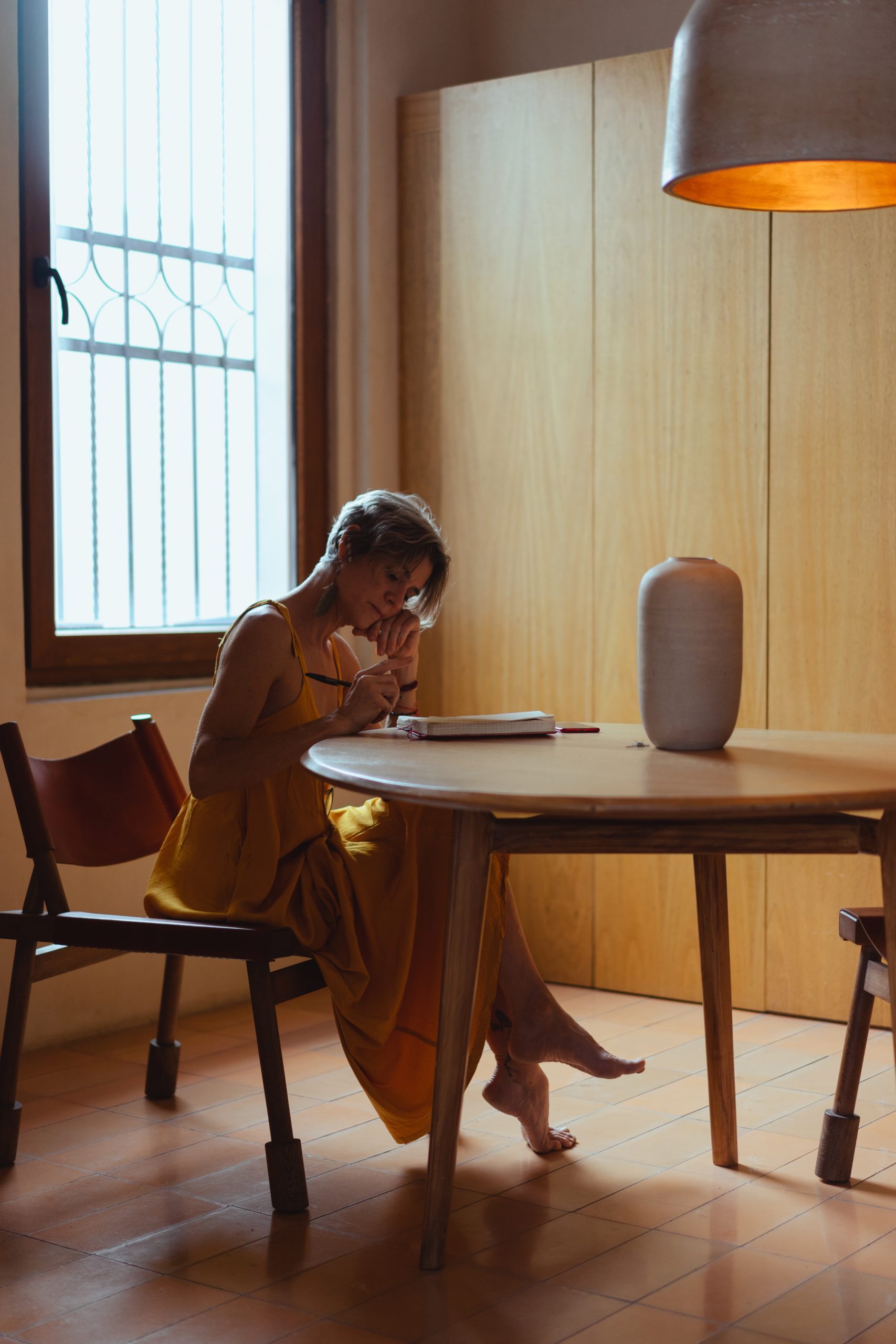 Woman intensively thinking _ writing